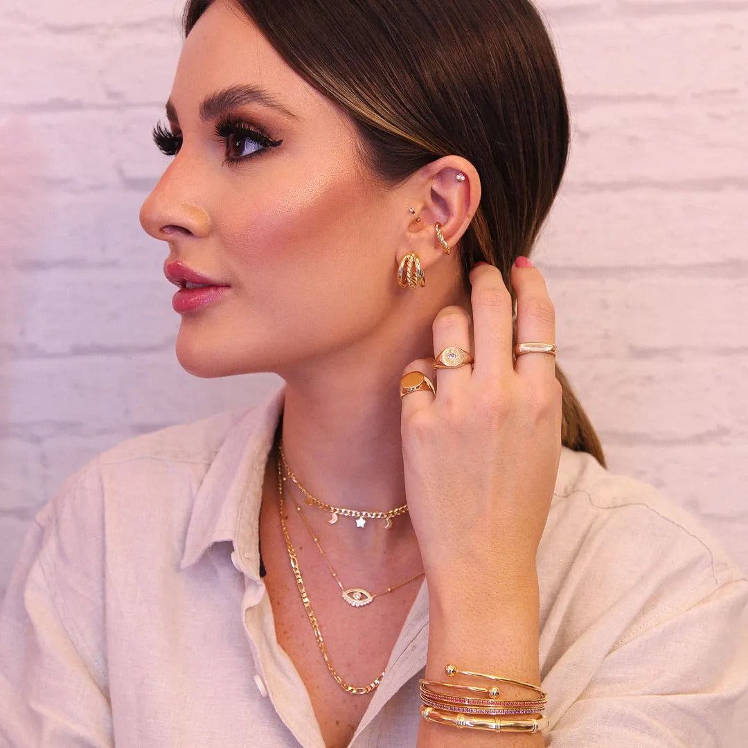 Piercing torcido banhado a ouro 18k