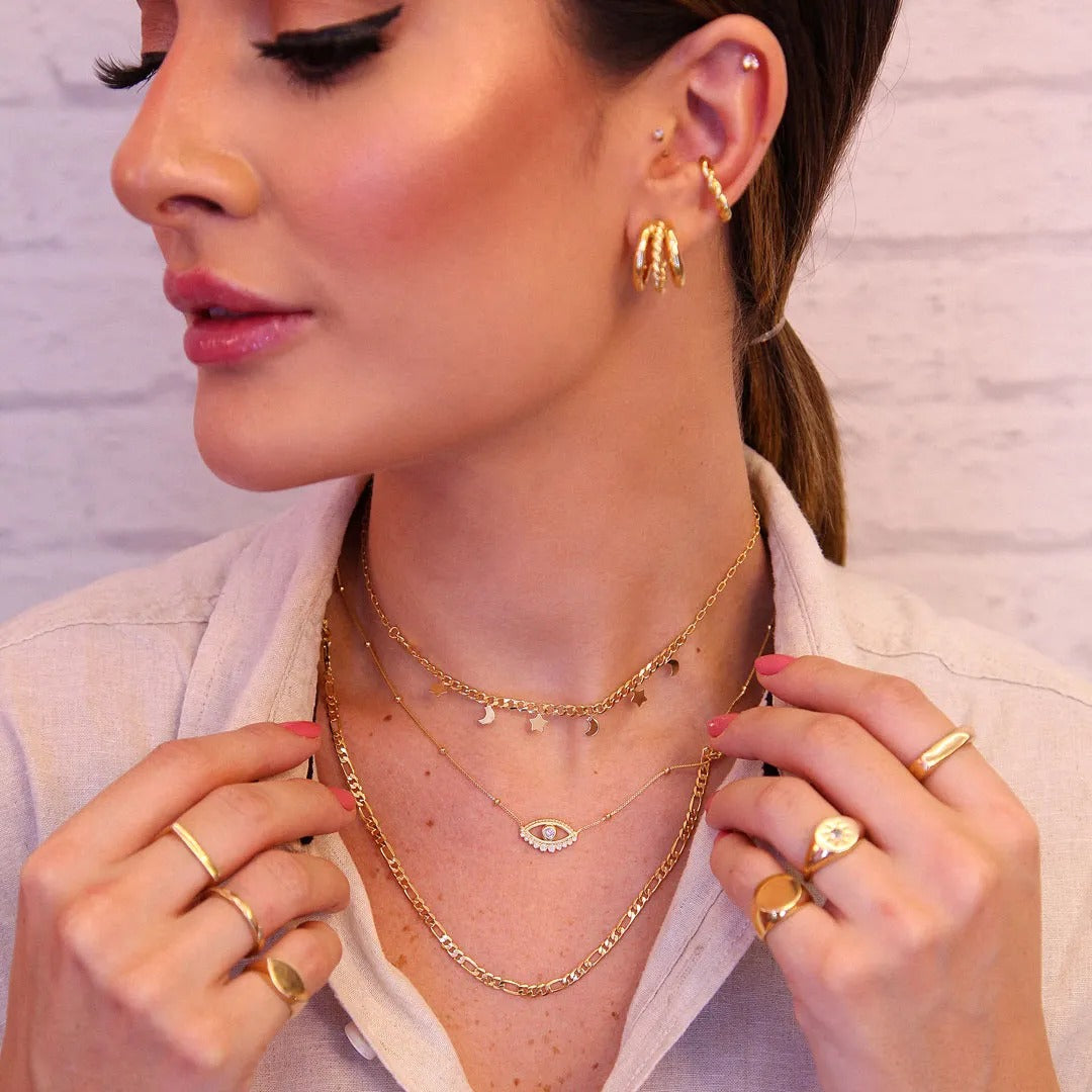 Piercing torcido banhado a ouro 18k