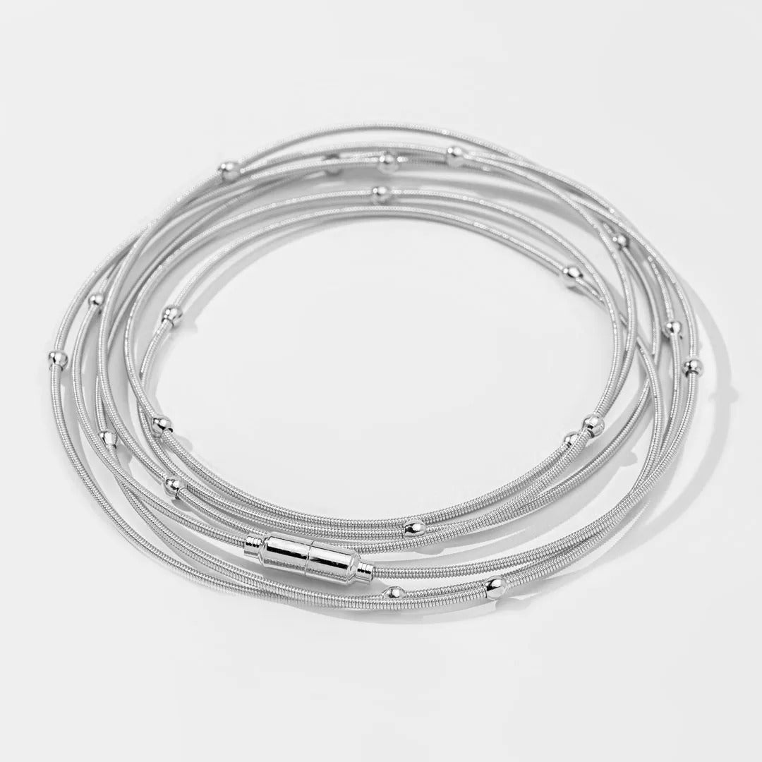 Pulseira corda de violão com bolinhas banhada em ródio branco