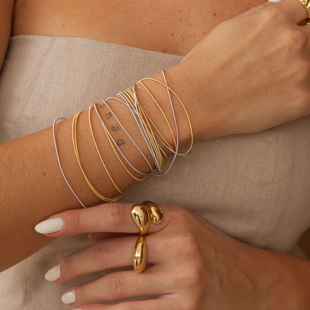 Pulseira corda de violão banhada a ouro 18k