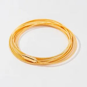 Pulseira corda de violão banhada a ouro 18k
