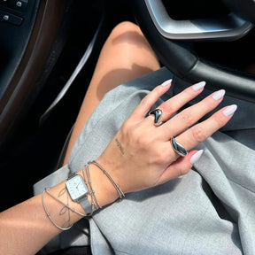 Pulseira corda de violão com bolinhas banhada em ródio branco