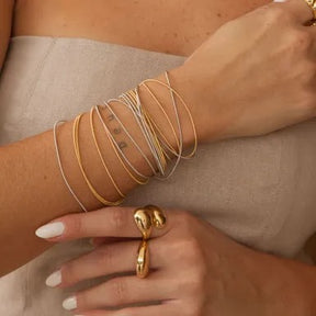 Pulseira corda de violão banhada em ródio branco