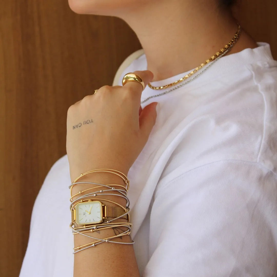 Pulseira corda de violão com bolinhas banhada a ouro 18k