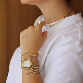 Pulseira corda de violão com bolinhas banhada a ouro 18k